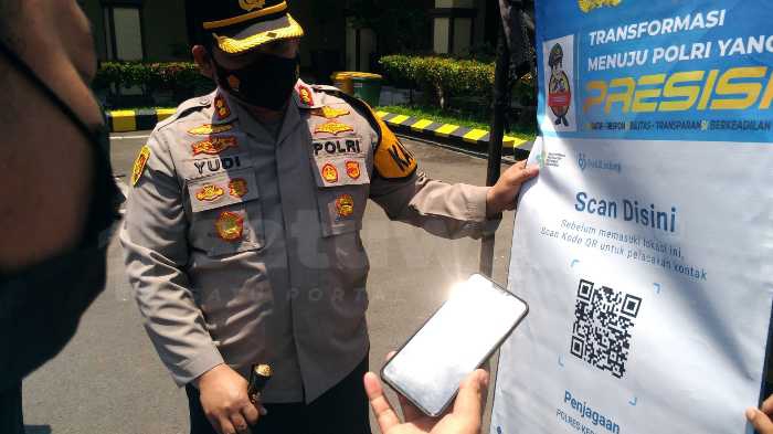 Photo of Polres Kediri Kota Terapkan Scan QR Code PeduliLindungi